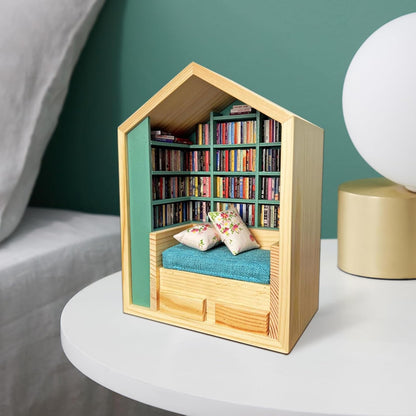 Miniature Anxiety Bookcase – An antique-style bookstore with tiny books